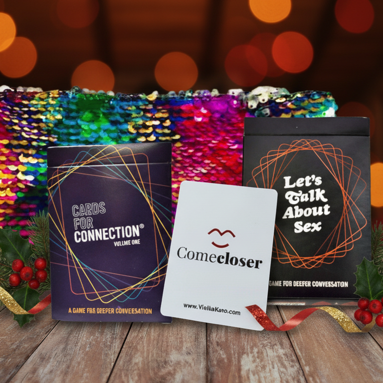 Three card decks including cards for connection, come closer, and let's talk about sex with a sparkle sequin bag on a wooden table.
