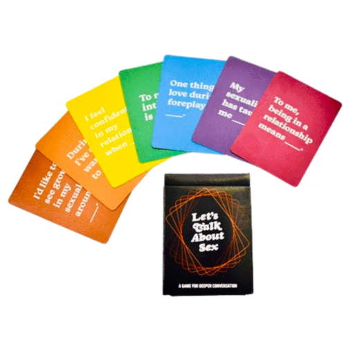 Rainbow fan of Let’s Talk About Sex conversation cards with the black tuck box in the center.
