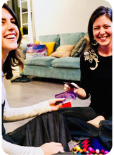 Load image into Gallery viewer, Two women are sitting on the floor playing Cards for Connection in a cozy living room setting.