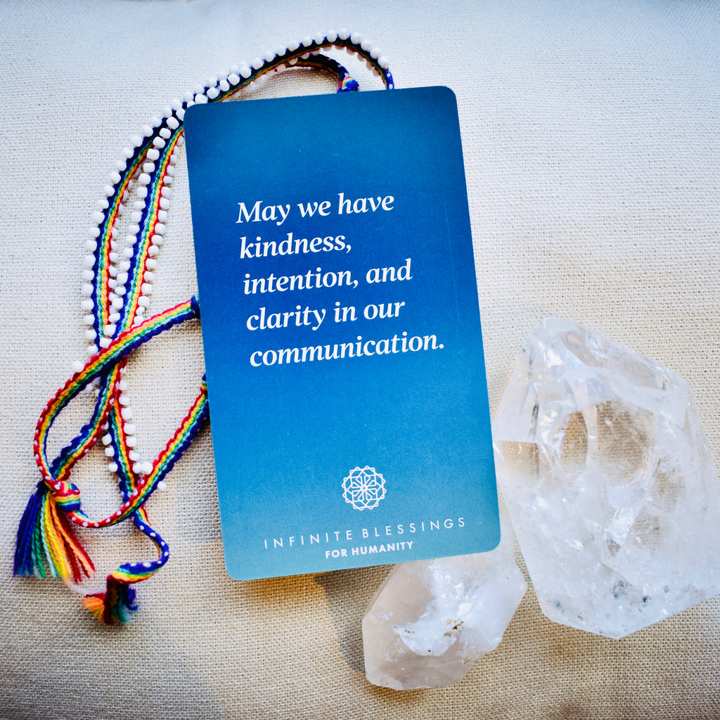 Infinite Blessings Deck - Games for Humanity Blue card with crystals and rainbow bracelet for an intention setting healing session 