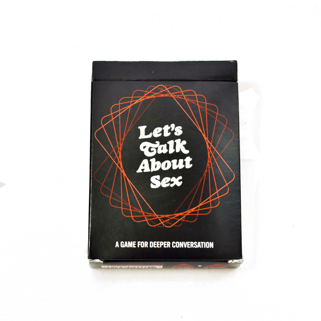 Six Let’s Talk About Sex cards in different colors arranged in a grid beside the tuck box.